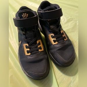 Nike brand Kyrie 4 .  Boys Size 13.5